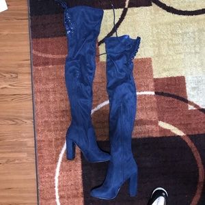 Over the knee blue boots